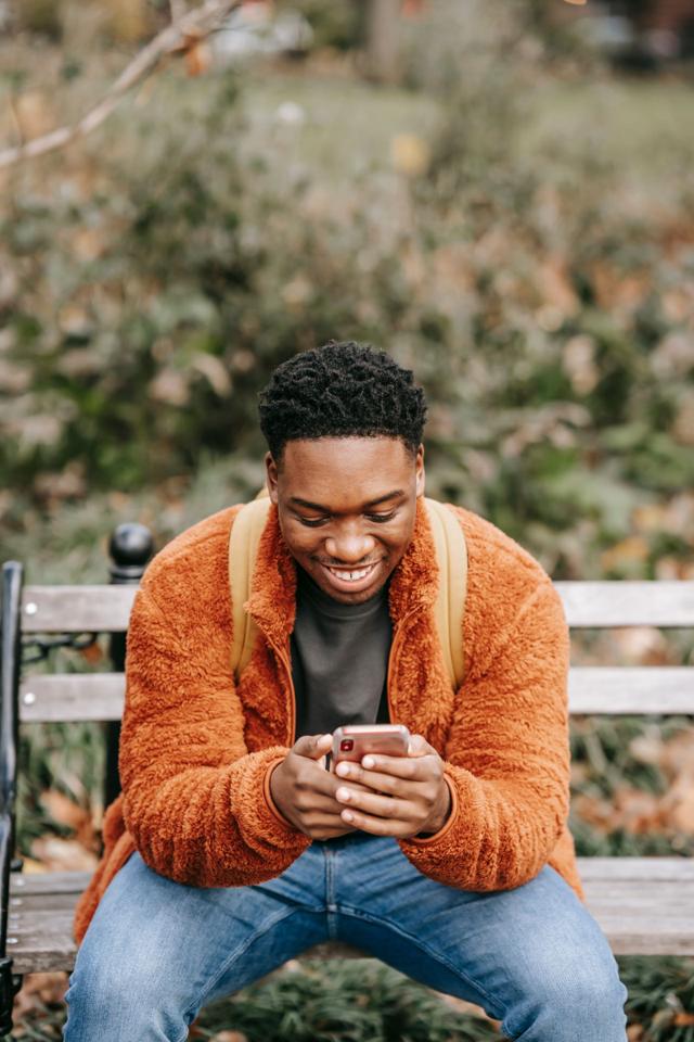 A creator checking their phone